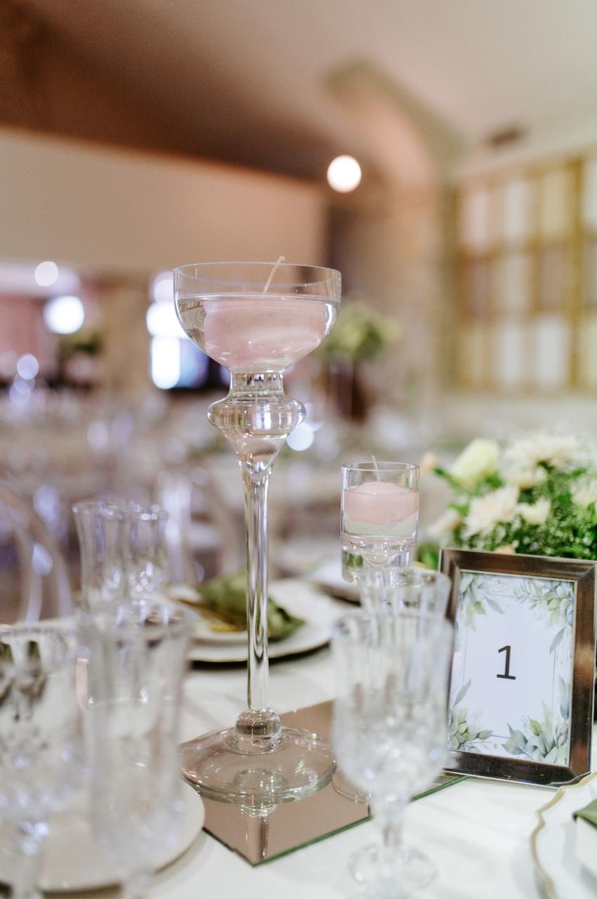 Crystal candle holder centrepiece on a reception table
